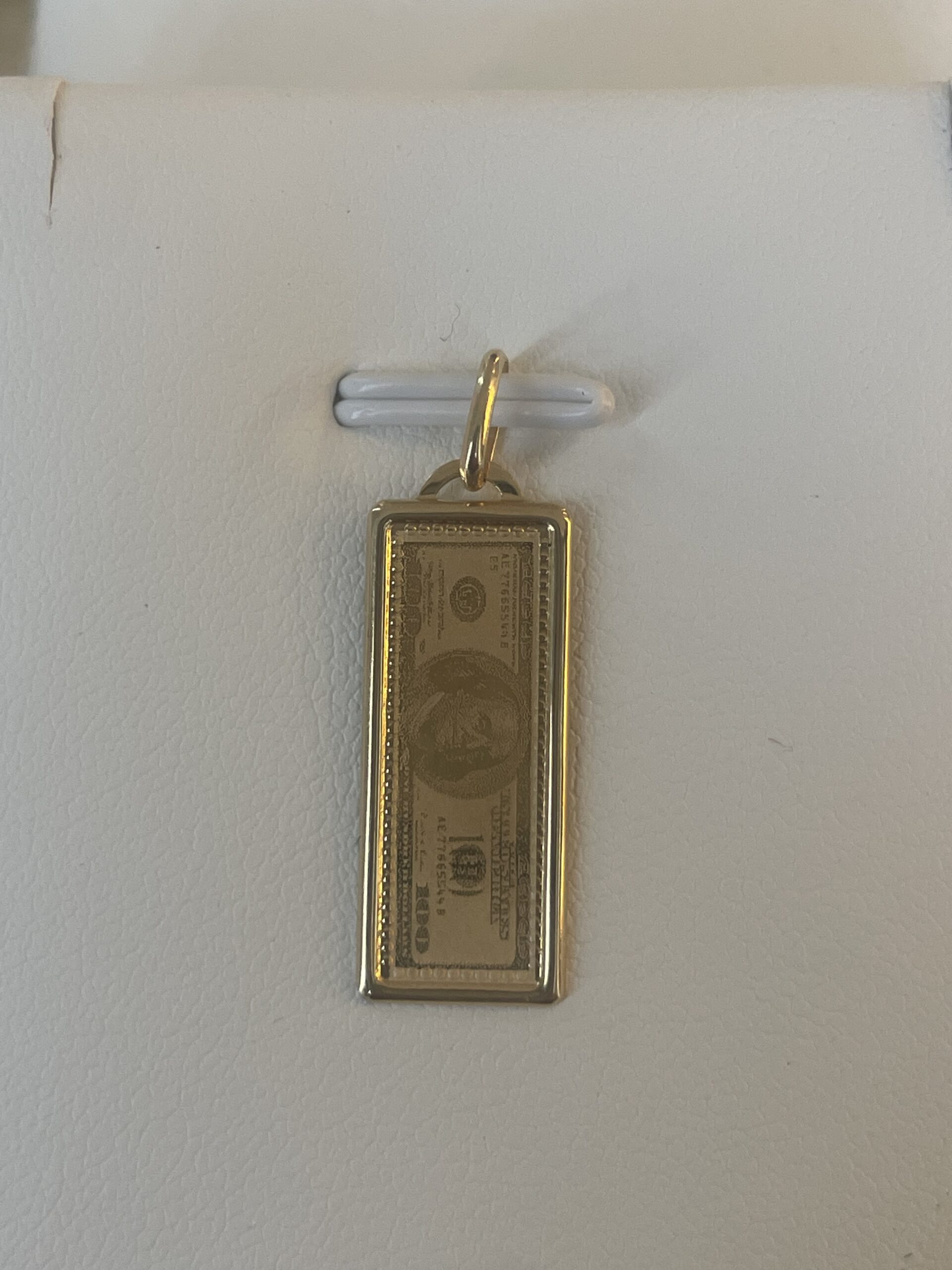 Dije Billete de $100